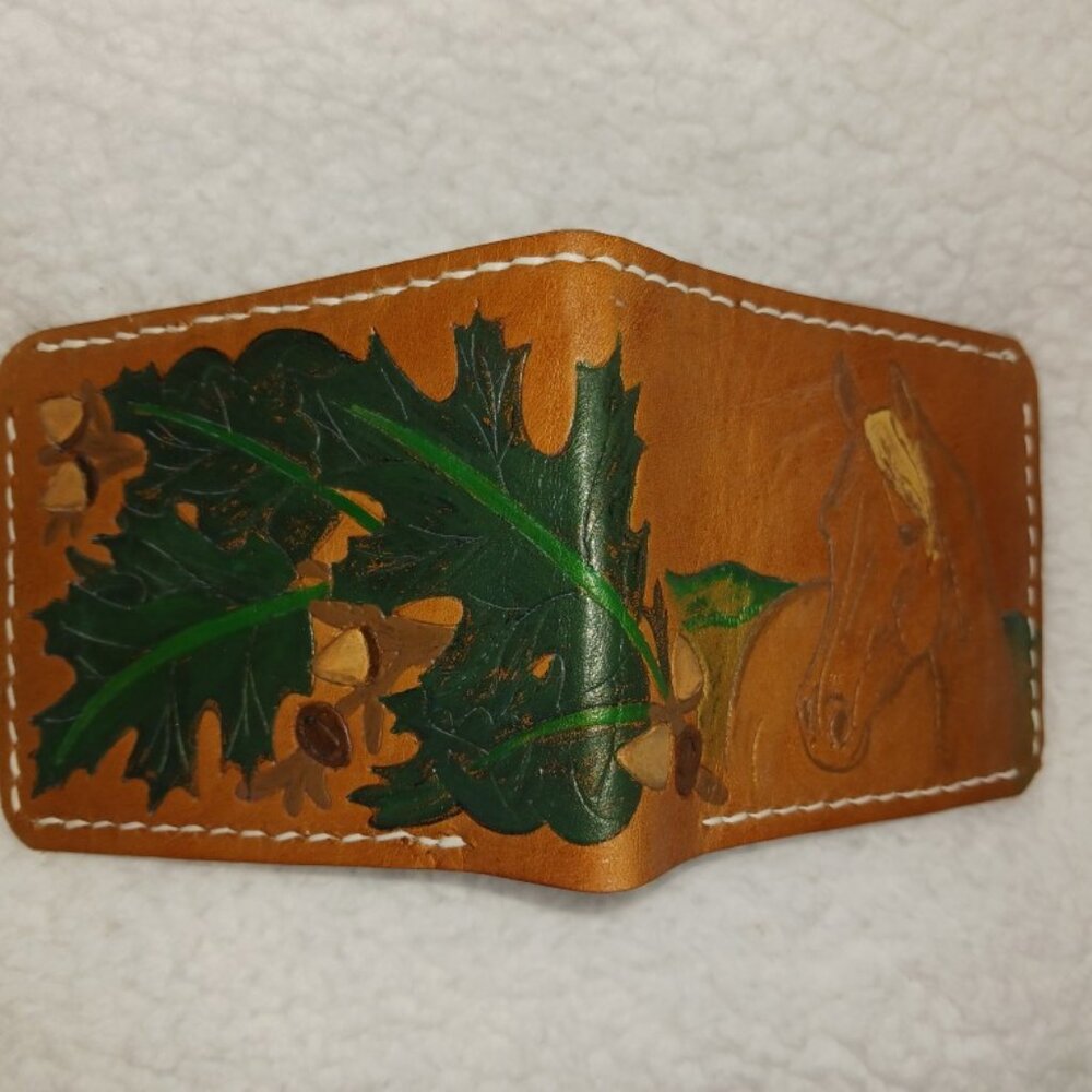 Handcrafted, carved horse and green oak leaves, leather wallet.